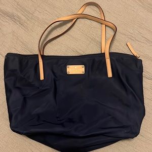 Kate Spade tote in navy with tan leather straps